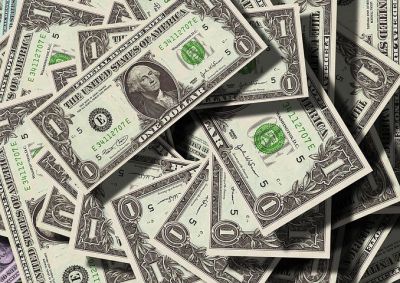 Dollar gains as investors brace for higher rates