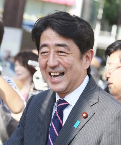With flowers and a gun salute Japan bids farewell 